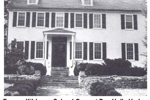 Old black-and-white photo of a building at HollyHedge Estate.